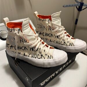 Converse High-Tops with Orange Lining and Text Design